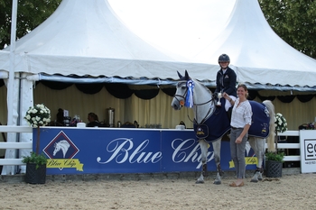 Rosie Walker and Grey Lad V win the Blue Chip Pony Newcomers Masters